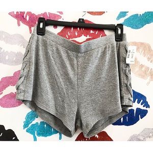 Woman’s Grey Shorts With Crisscross Sides